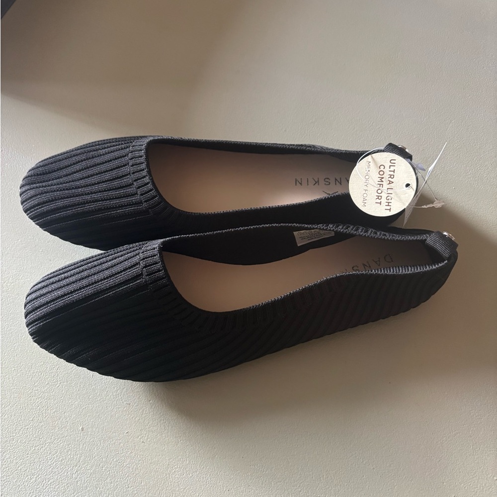 Black flats size 8.5 new with tags.